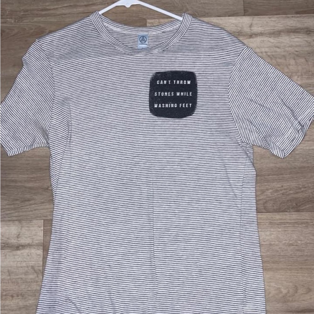 Jesus graphic tee. “Can’t throw stones while washing feet”